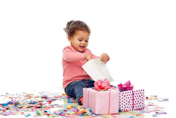 Happy little baby girl with birthday presents — Stock Photo, Image