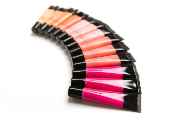 Zblízka lip gloss trubek — Stock fotografie