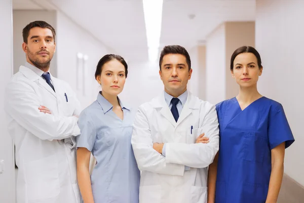 Group of medics or doctors at hospital — Stock Photo, Image