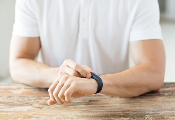 Close up of man with heart-rate watch — Stock Photo, Image