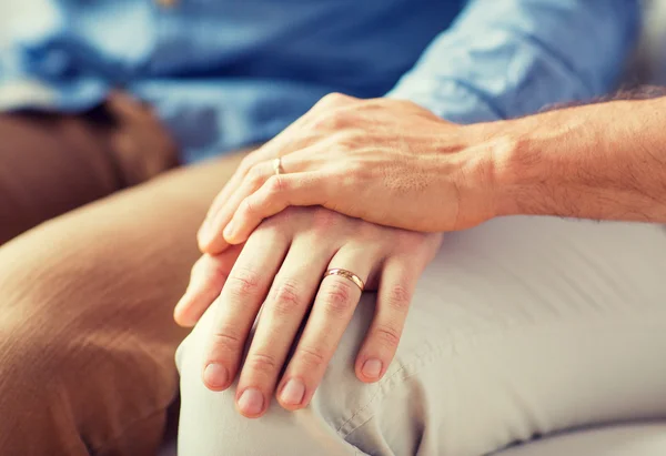 Close up of happy male gay couple holding hands — Stock Photo, Image