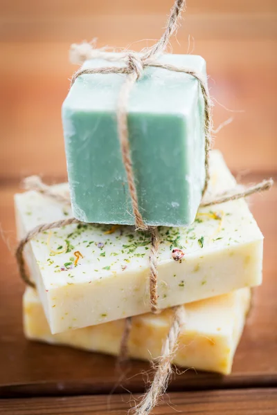 Close up of handmade soap bars on wood — Stock Photo, Image