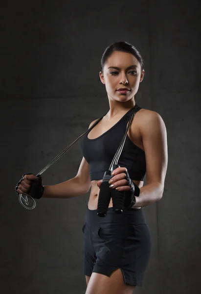 Young sporty woman with jumping rope Royalty Free Stock Photos