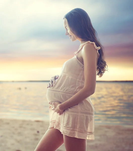 Happy pregnant woman in chemise — Stock Photo, Image