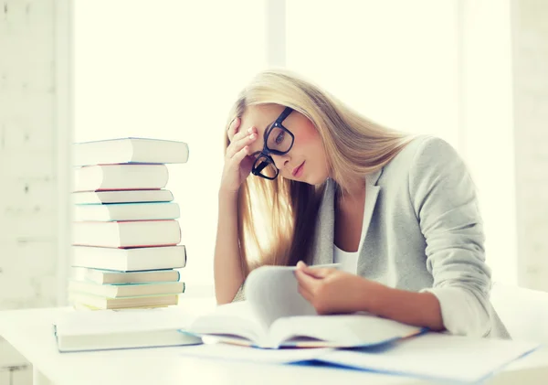 Student with books and notes — Stock Photo, Image