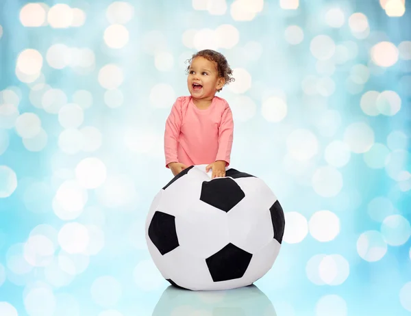 Happy mulatto little baby girl playing with ball — Stock Photo, Image