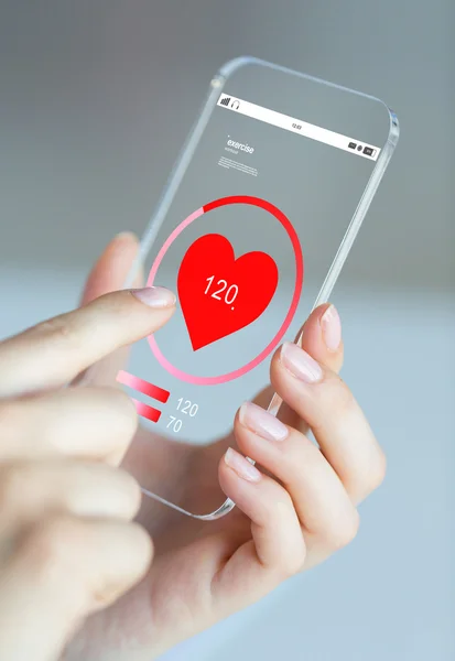 Close up of hand with heart rate on smartphone — Stock Photo, Image