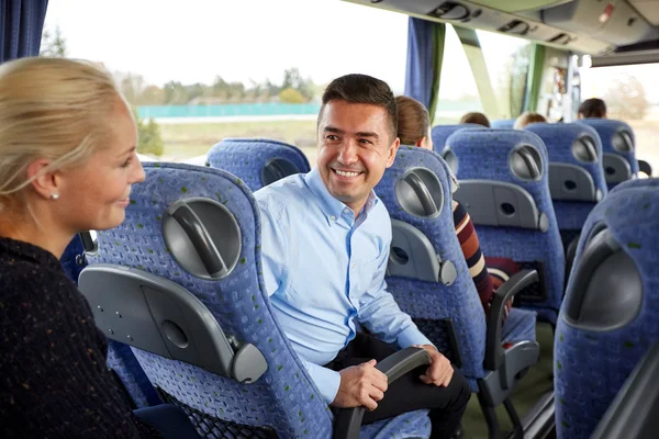 Group of happy passengers in travel bus — Stock Photo, Image