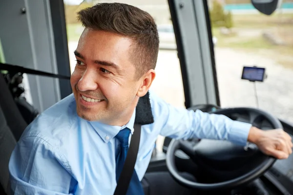 Happy driver driving intercity bus — Stock Photo, Image