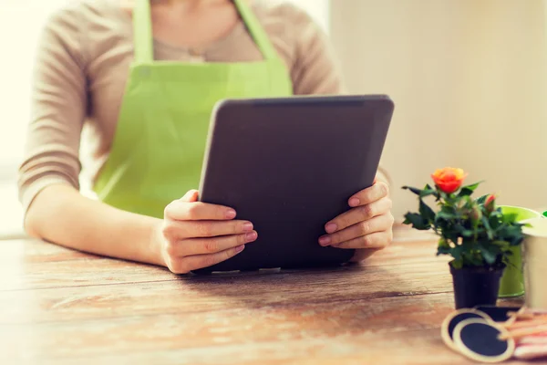 Close up of woman or gardener holding tablet pc — Stock Photo, Image