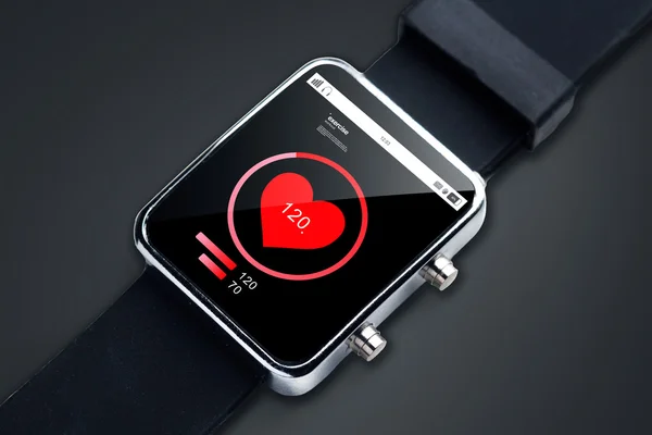 Close up of smart watch with pulsometer app — Stock Photo, Image