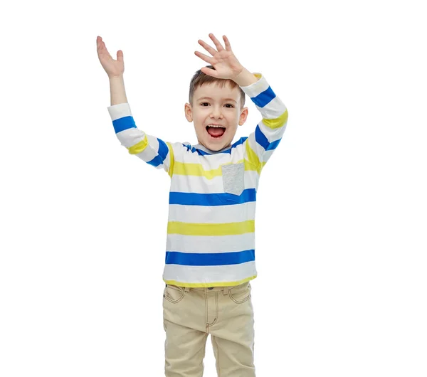 Pequeno menino feliz acenando as mãos — Fotografia de Stock