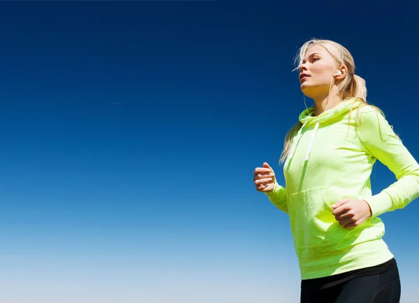 Woman doing running outdoors — Stock Photo, Image