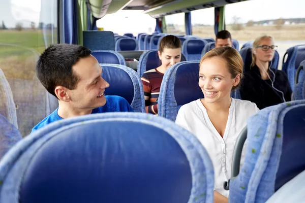 Group of happy passengers in travel bus — Stock Photo, Image