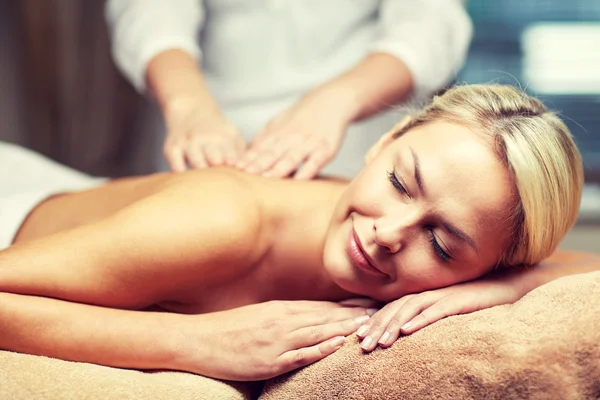 Close up of woman lying and having massage in spa — Stock Photo, Image