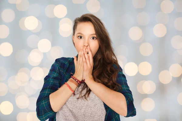 Scared teenage girl over holidays lights — Stockfoto
