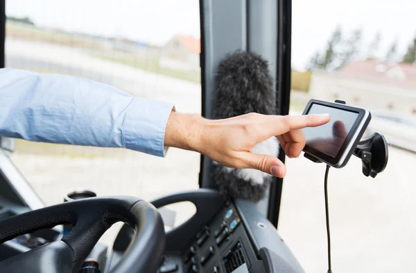 Close up of bus driver driving with gps navigator — Stock Photo, Image