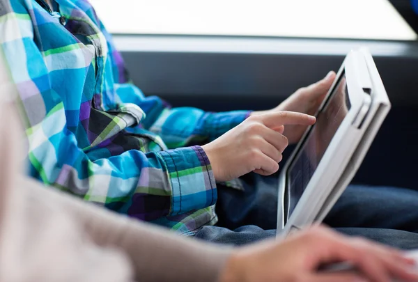 Close up of boy with tablet pc in travel bus — Stock Photo, Image