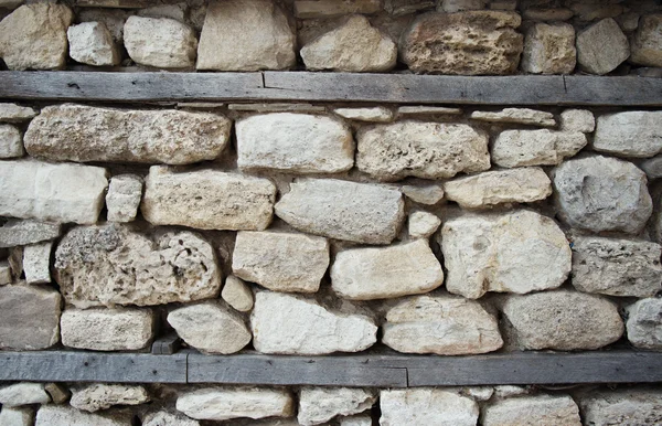 Ősi kő fal háttér — Stock Fotó