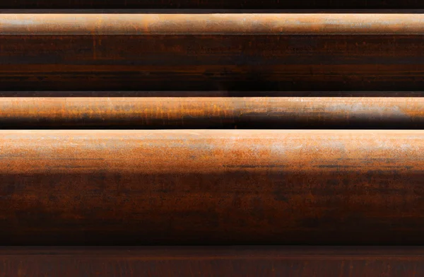 Horizontal seamless pattern of rusty pipes — Stock Photo, Image