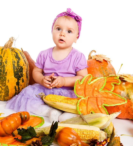 Baby with autumn harvest — Stock Photo, Image