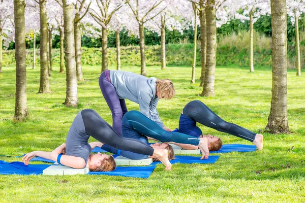 Halasana, plow pose — Stockfoto