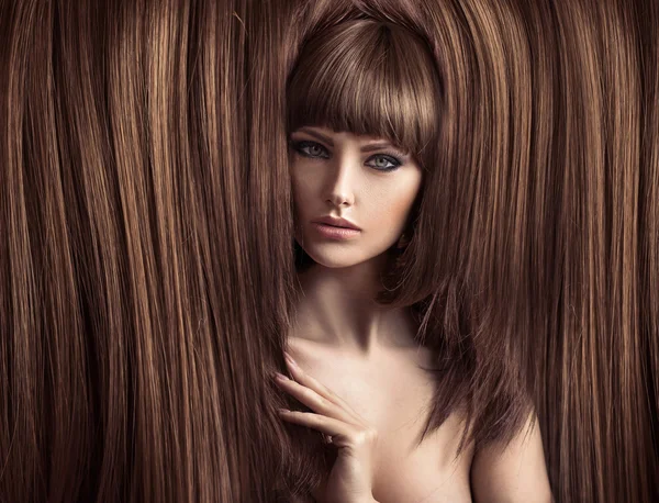 Sensual lady with a fluffy coiffure — Stock Photo, Image