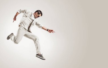 Yakışıklı, yetenekli bir dansçının dans figürü.