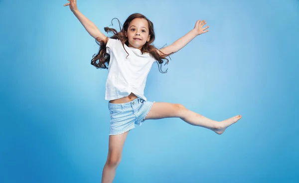 Cheerful Cute Child Jumping Blue Room — Stock Photo, Image