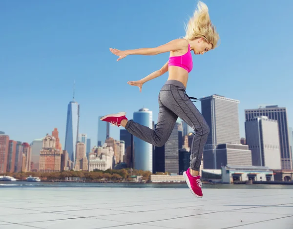 Pretty athlete running in the downtown — Stock Photo, Image