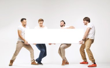 Casual clothed guys carrying huge billboard clipart