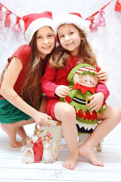 Portrait of two santa sisters — Stock Photo, Image