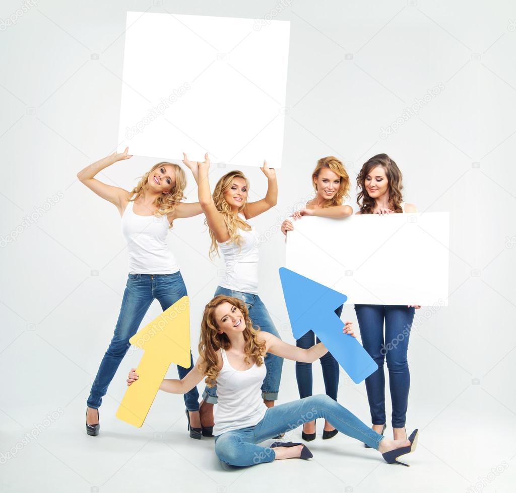 Attractive and cheerful women promoting something