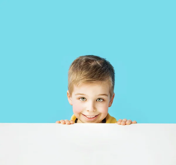 Small, cute smiling boy making faces — Stock Photo, Image