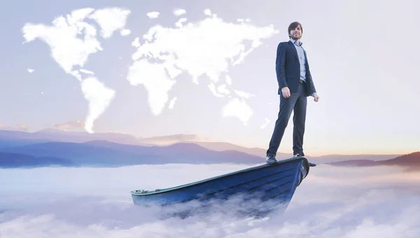 Young manager under the cloud world map — Stock Photo, Image