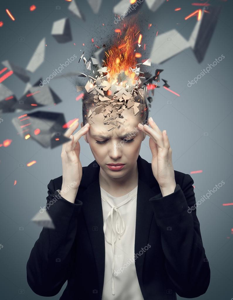 Attractive businesswoman with exploding headache Stock Photo by ©konradbak  71985809