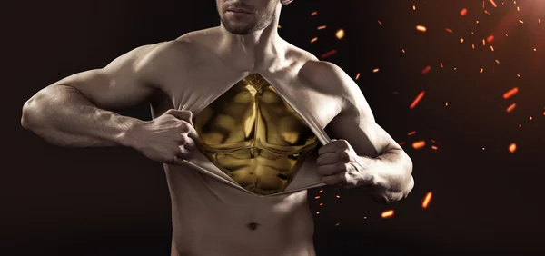 Muscular dummy made of gold — Stock Photo, Image