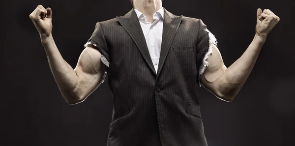 Muscular businessman achieving a life success — Stock Photo, Image