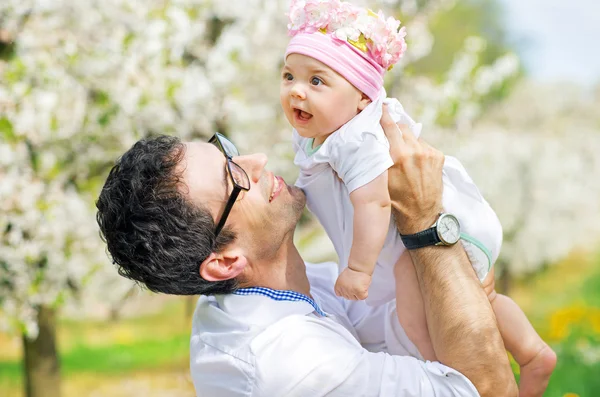 Happy father cuddling his cute daughter — Stock Photo, Image