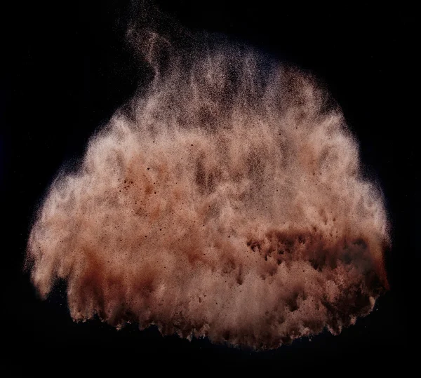 Tornado de polvo marrón sobre fondo oscuro — Foto de Stock