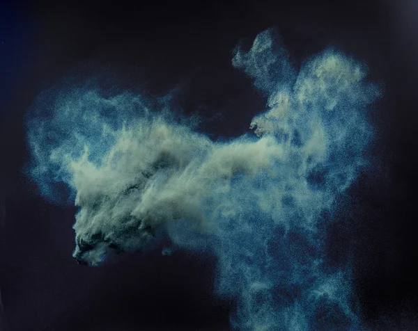 Nube conceptual de un polvo azul —  Fotos de Stock