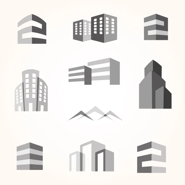 Iconos de silueta de edificios de ciudad vectorial — Vector de stock