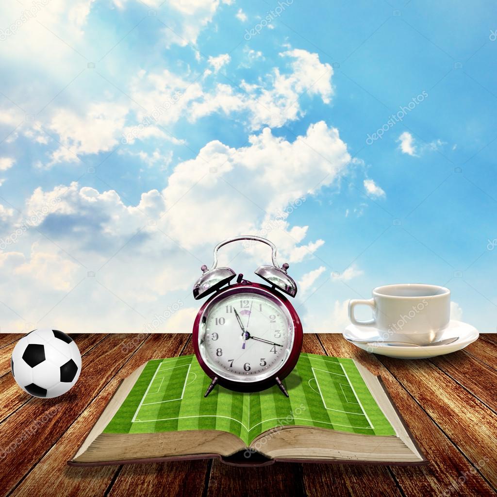 Time to rest with coffee and soccer book