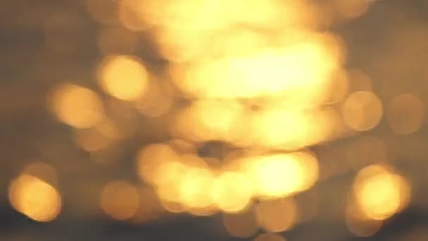 Sonnenuntergang Lichtreflexion Auf Meeresbrandung Oberfläche Bokeh Licht Verschwommen Hintergrund — Stockvideo