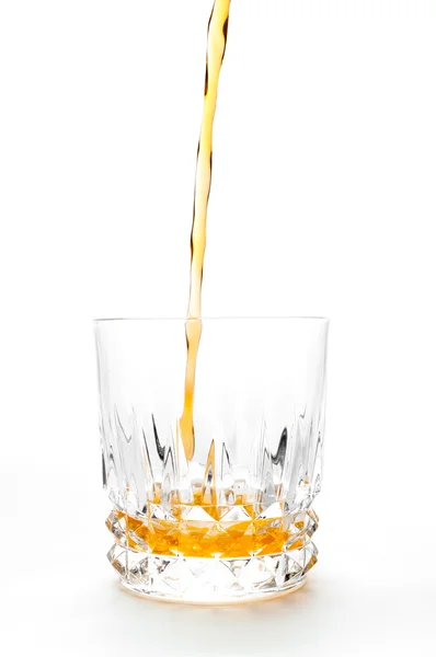 Jus d'orange in de geïsoleerd glas — Stockfoto