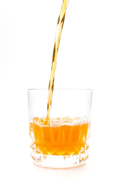 Jus d'orange in de geïsoleerd glas — Stockfoto