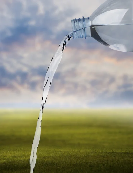 Pouring water against the nature background, Freshness concept — Stock Photo, Image