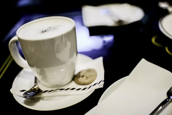 Hot coffee with cookie — Stock Photo, Image