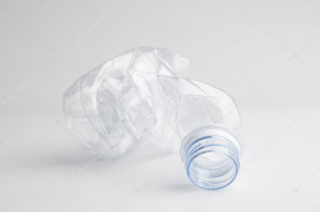 Empty plastic water bottle for recycling