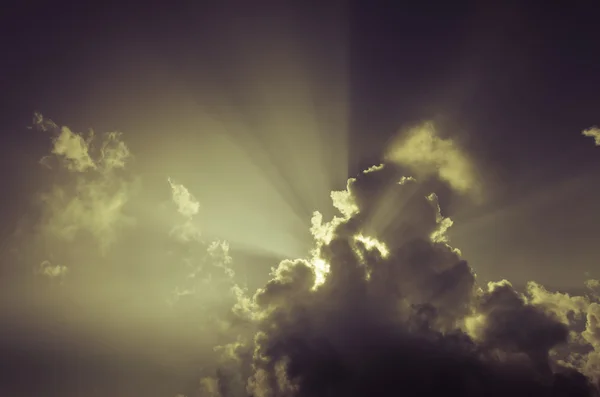 Nice sun beam shining through clouds sky — Stock Photo, Image